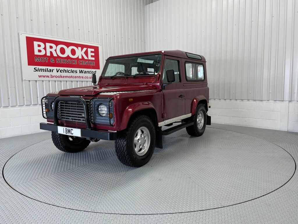 Compare Land Rover Defender 90 4X4 2.5 Td5 County Hard Top Swb 200403 EU03ETL Red