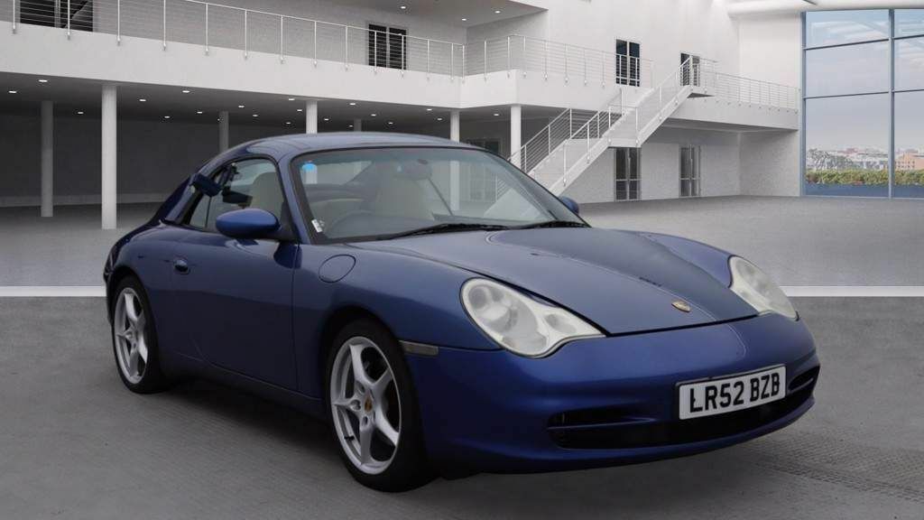 Compare Porsche 911 Coupe 3.6 996 Carrera 2 Tiptronic S 200252 LR52BZB Blue
