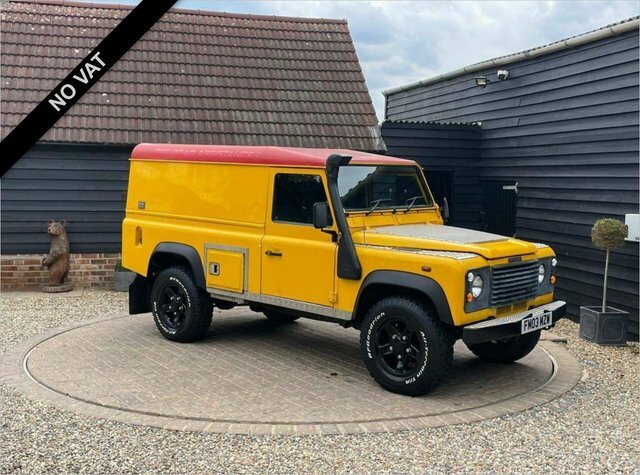 Compare Land Rover Defender 110 110 Td5 County Hard FM03MZW Yellow