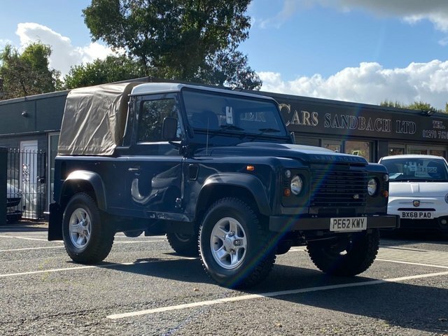 Compare Land Rover Defender 2.2 Td Pick Up 122 Bhp PE62KWY Blue