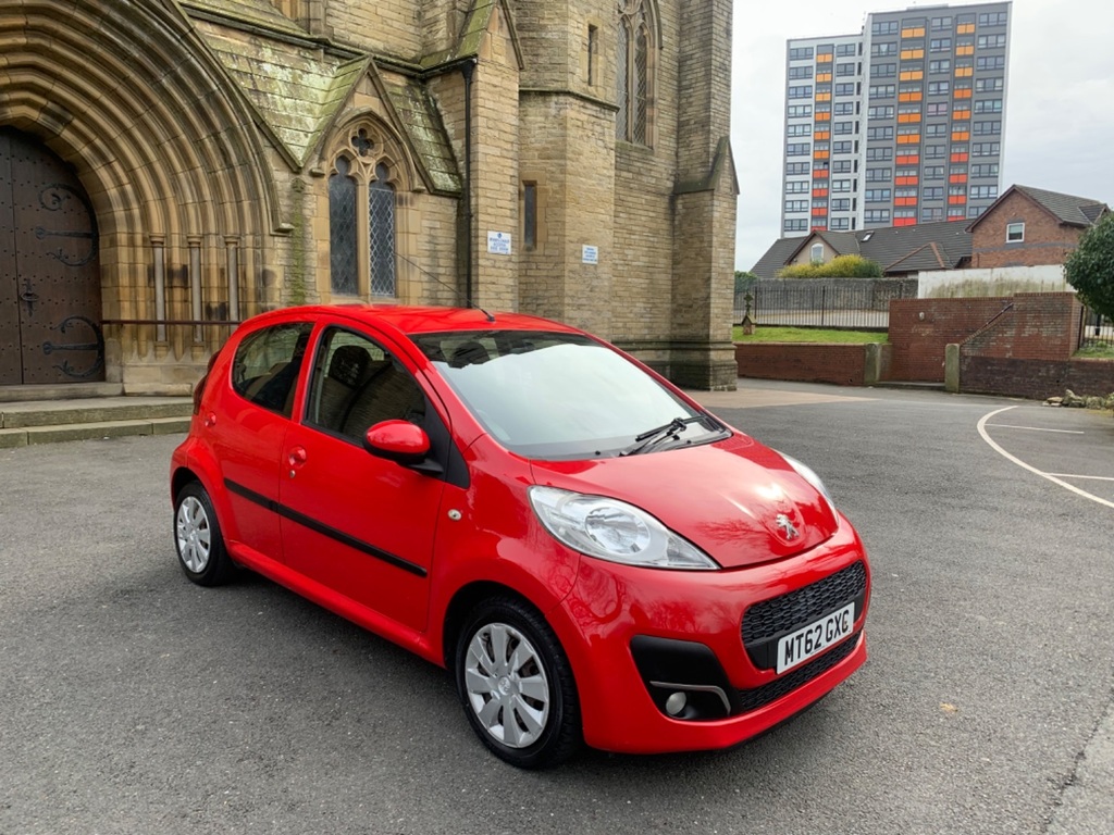 Compare Peugeot 107 1 12V Active 2012 MT62GXC Red