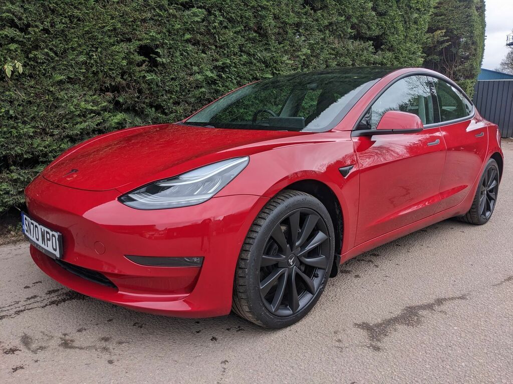 Compare Tesla Model 3 Model 3 Long Range Awd SN70WPO Red
