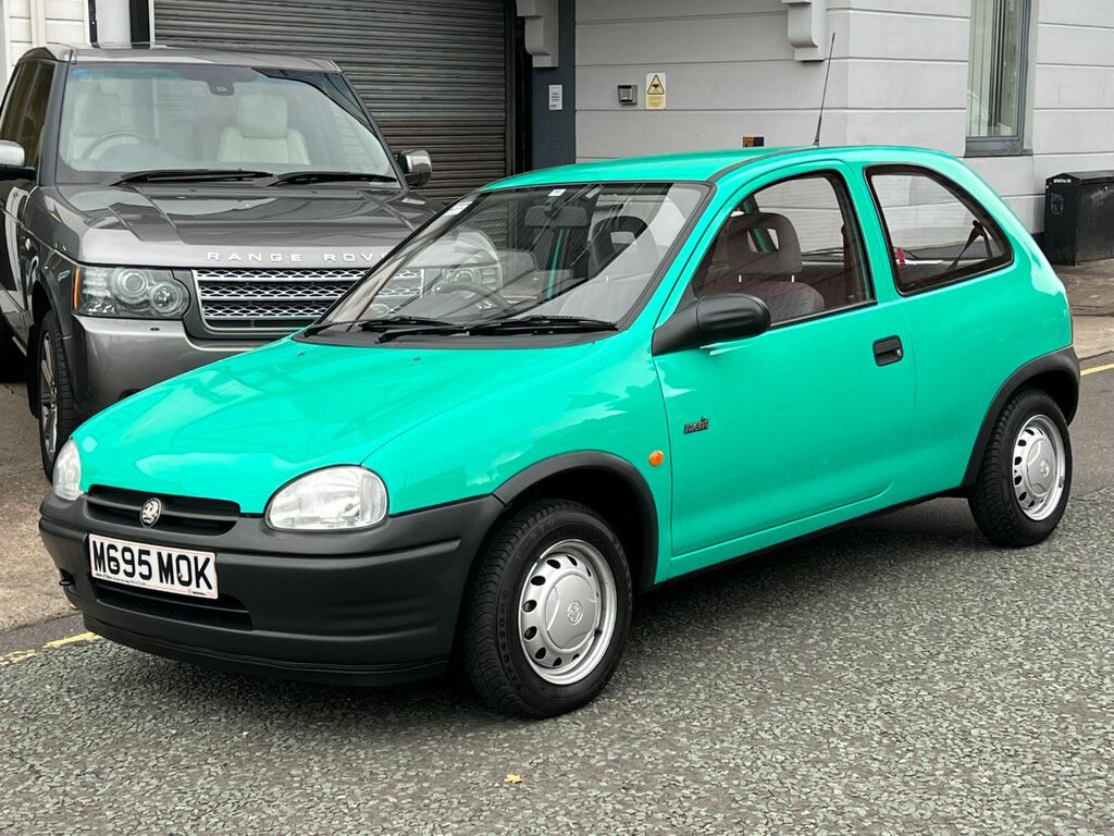Compare Vauxhall Corsa Merit D7LHW Green