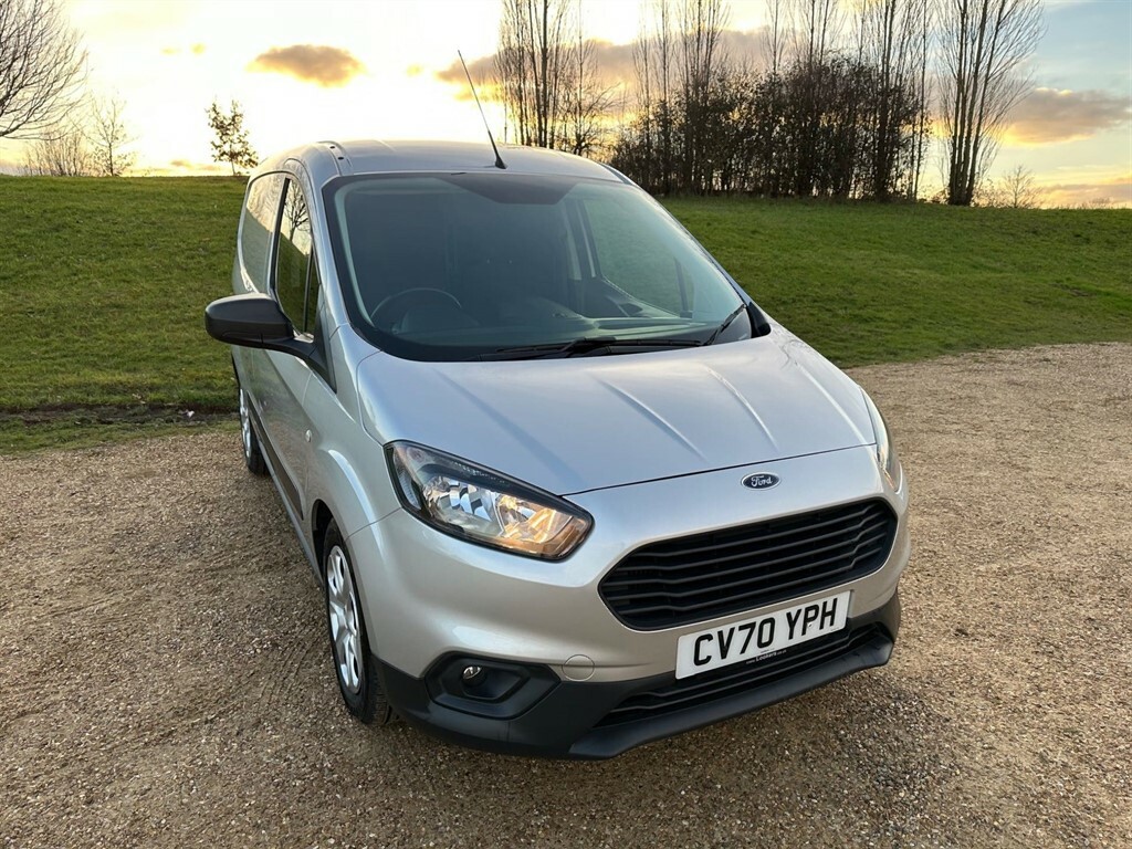 Compare Ford Transit Courier Trend CV70YPH Silver